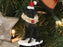 XS9485 Resin Dog ornament with bottle brush tree
