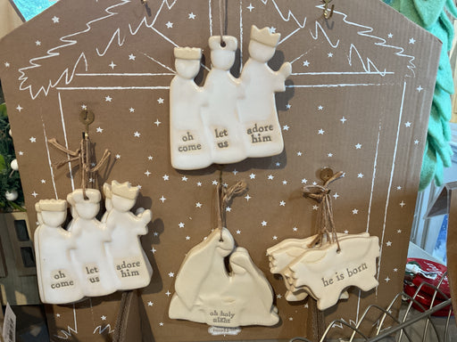 Nativity Ornaments on board display 46700378